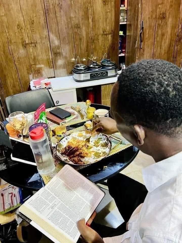 A pastor studying the word of God after giving his members 21days of dry fasting and prayers