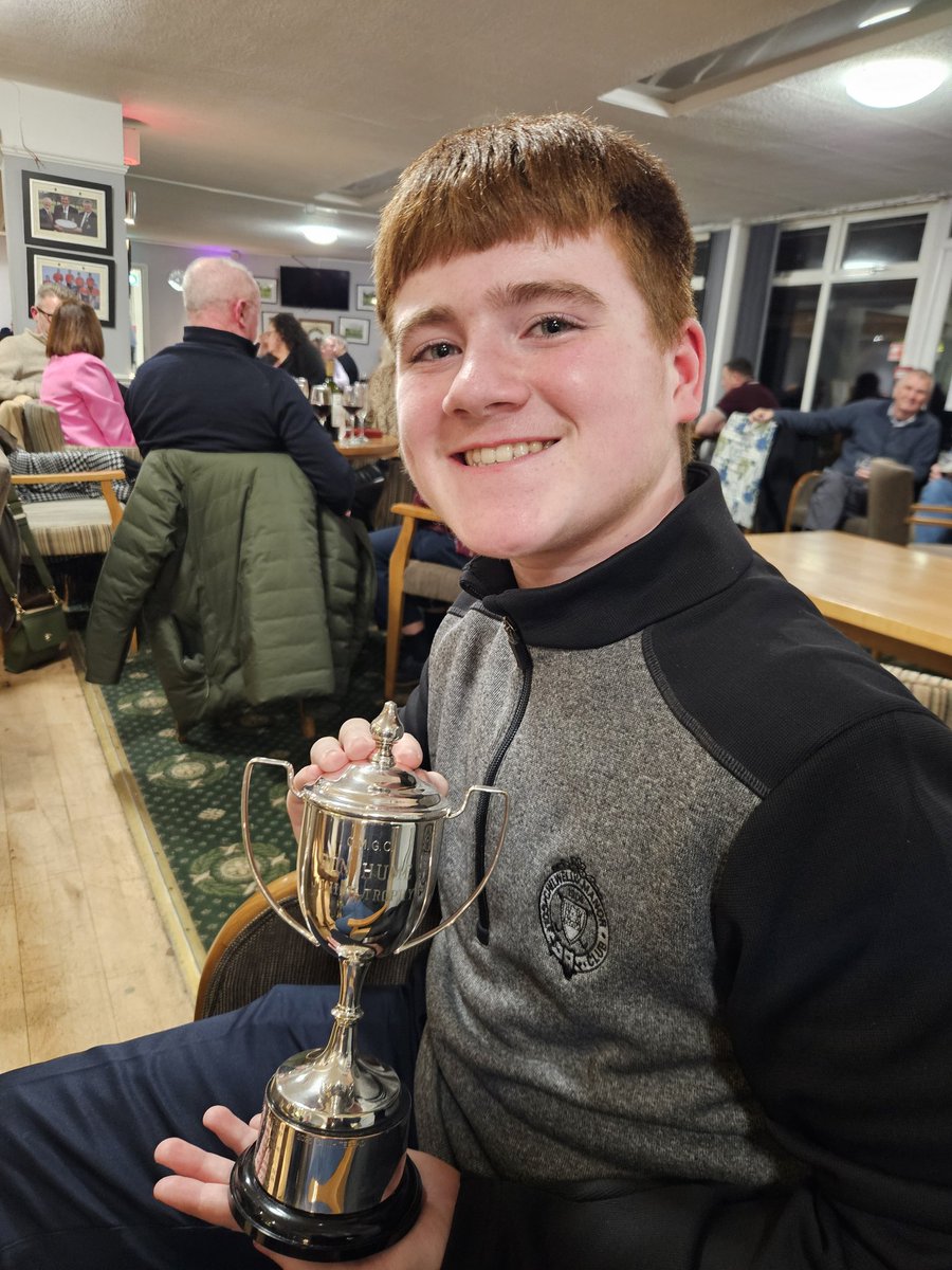 HaydenWhitehead's tweet photo. Presentation evening at the golf club tonight and George finally got his hands on the Ron Hume Trophy he won earlier this year. Very proud dad 🏆 https://t.co/8D0QClUUma