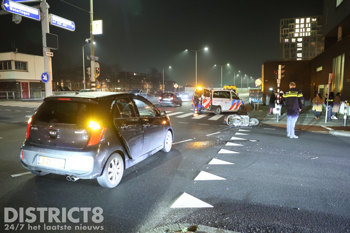 Aanrijding tussen motorscooter en auto op Neherkade