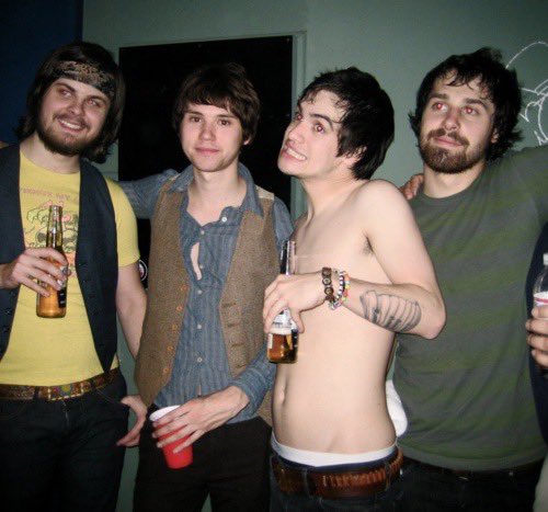 criminaldimes's tweet image. Two photos from the same night… where’d Brendon’s shirt go…… why is Ryan’s shirt partially unbuttoned………#fishy