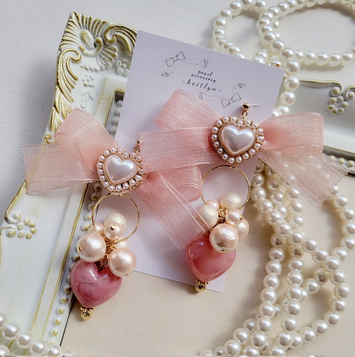 再販❣️大ぶり美発色ピンクのリボンと鮮やかピンクのサッカーボールのピアス♡ 4905741844813.jpg