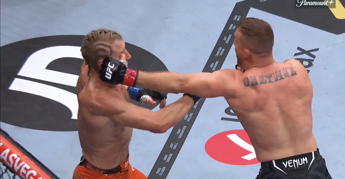 What a fight that was! ref was poor imo. The pic in particular was significant in the rest of the round if not rest of the fight. Missed low blows too. 
Dunno what was up with mat either. at times was like they were on ice! Justin edged it deserved winner #UFC324 #UFCParamount