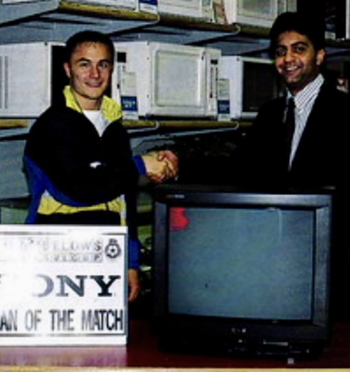 35 years ago today:

Dennis Wise collects his Rumbelows man of the match prize from his local West London store.

A 21-inch remote controlled Sony colour television set with Teletext.

What a time to be alive.