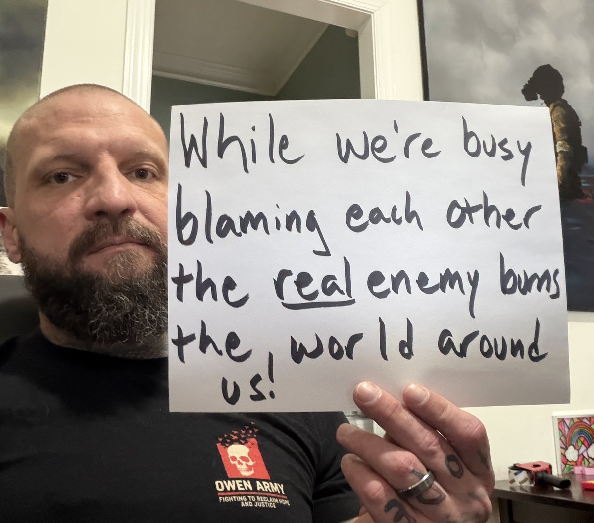 They don’t have to beat us.
They just have to keep us blaming each other.
While we fight sideways, the real enemy burns everything we love.