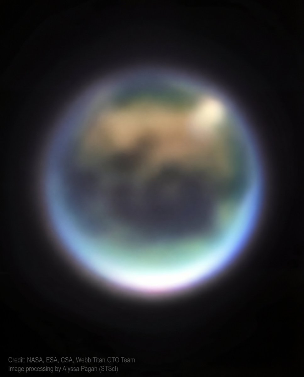 A blurred photo of Earth? 

Nope, this is Titan, Saturn's largest Moon captured by James Webb