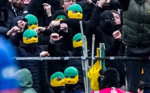 EstebanPinel's tweet photo. Une tribune française en 2026. Des types cagoulés. Instances, autorités, clubs, responsables de groupes supporters, on arrête quand le délire ? On écarte quand ces malades des stades et des familles qui les fréquentent -peu importe le club ? #Ligue1 @Prefet44 @A_N_Supporters https://t.co/y3pF6UmK6b