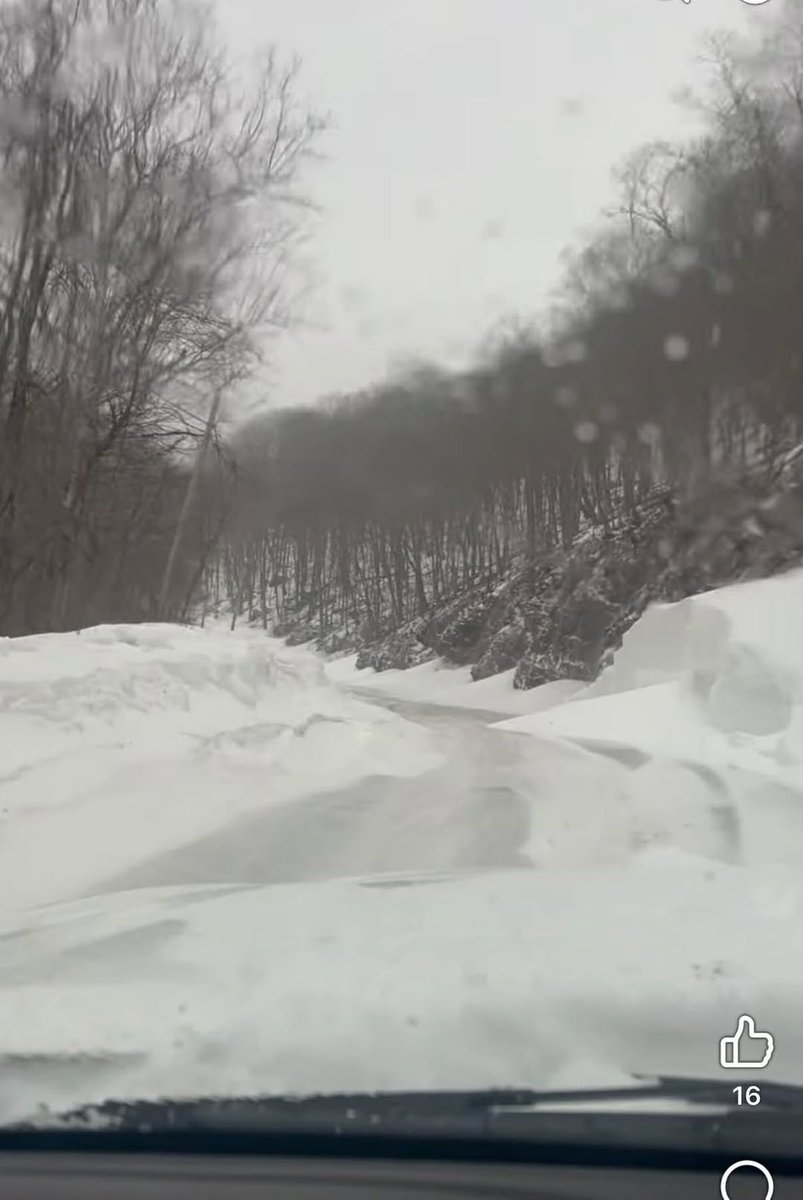 Wow! Another photo from Pendleton County, WV Emergency Manager of sleet falling off the mountainside into the road. They are having to use skid loaders to move the 6-8 feet of sleet in spots! #WVwx