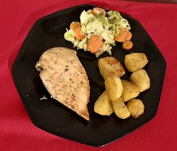 I made oven roasted chicken breast, Yukon gold potatoes, and California blend vegetables with cauliflower, broccoli, and carrots.
