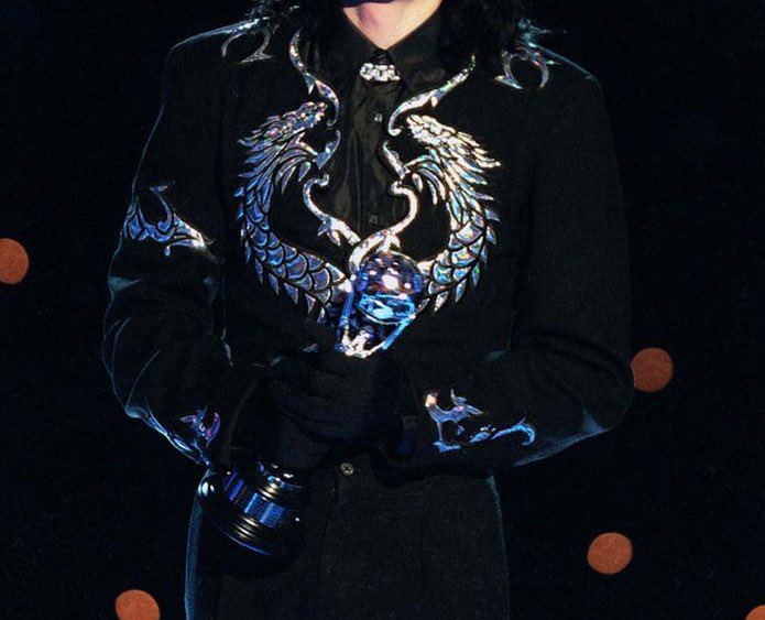the holographic dragons details in this jacket michael jackson wore in 2000.