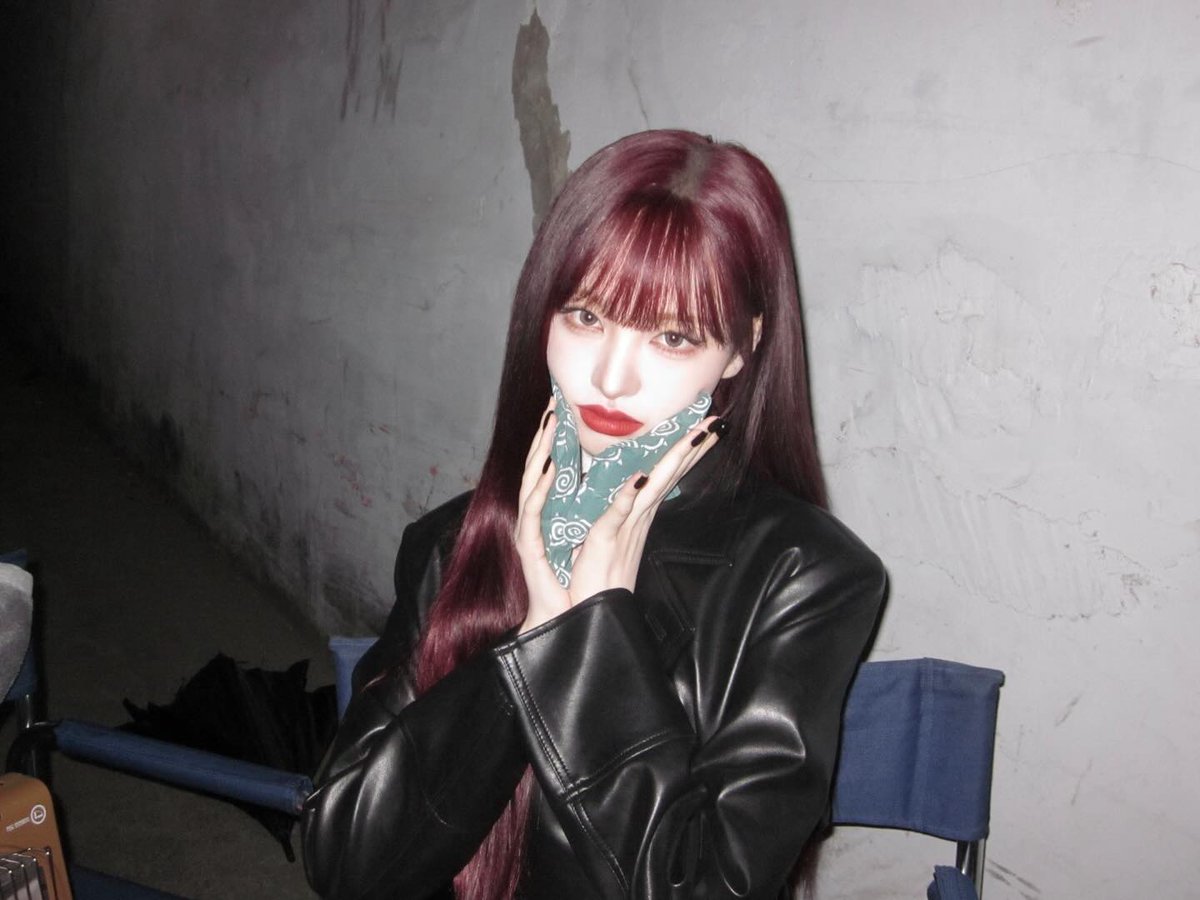 Lijzzie's tweet photo. leather wrapped tight around a quiet pause, red hair catching the last warmth in a concrete room. Between messages unsent and thoughts unfinished, I sit still, unrushed, entirely my own. The night hums softly beside me, cold walls, folding chairs, a borrowed heater glow. https://t.co/cLAEXMGsCt
