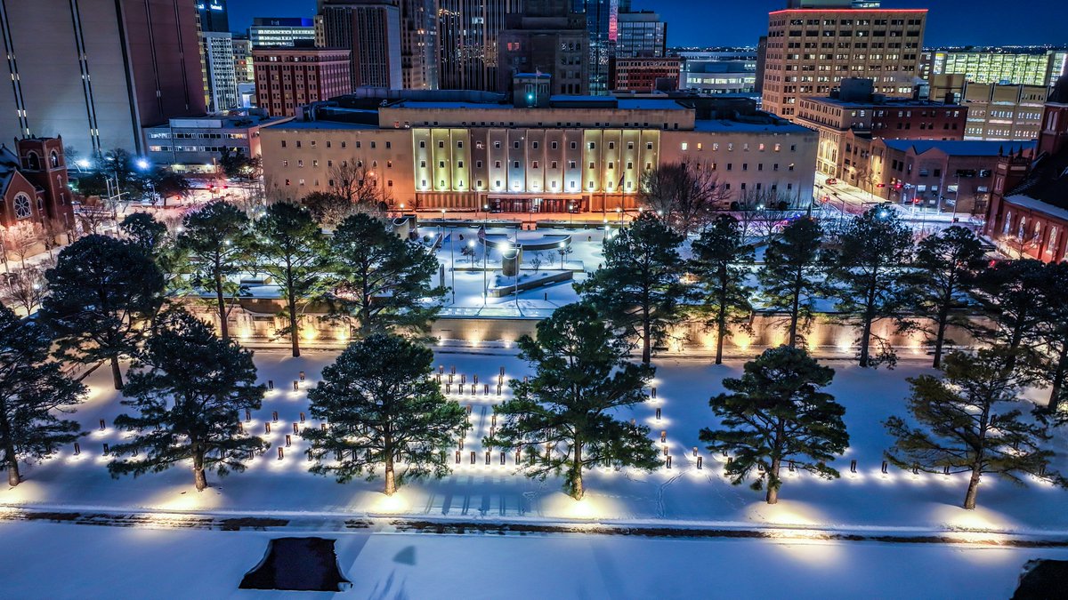 flighttimeokc's tweet photo. More from the Oklahoma City National Memorial &amp; Museum outdoor memorial from last night. May be some of my favorite shots I have ever taken at the Memorial. The snow covered grounds provide a peaceful, serene place in the middle of a busy downtown area. https://t.co/6JTC1GB1b3