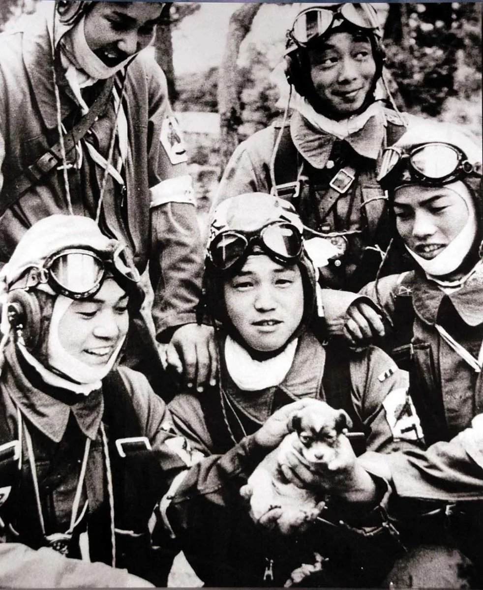 Kamikaze pilots posing with a puppy the day before leaving on a mission, 1945.

Learn more: bit.ly/48BI3S1