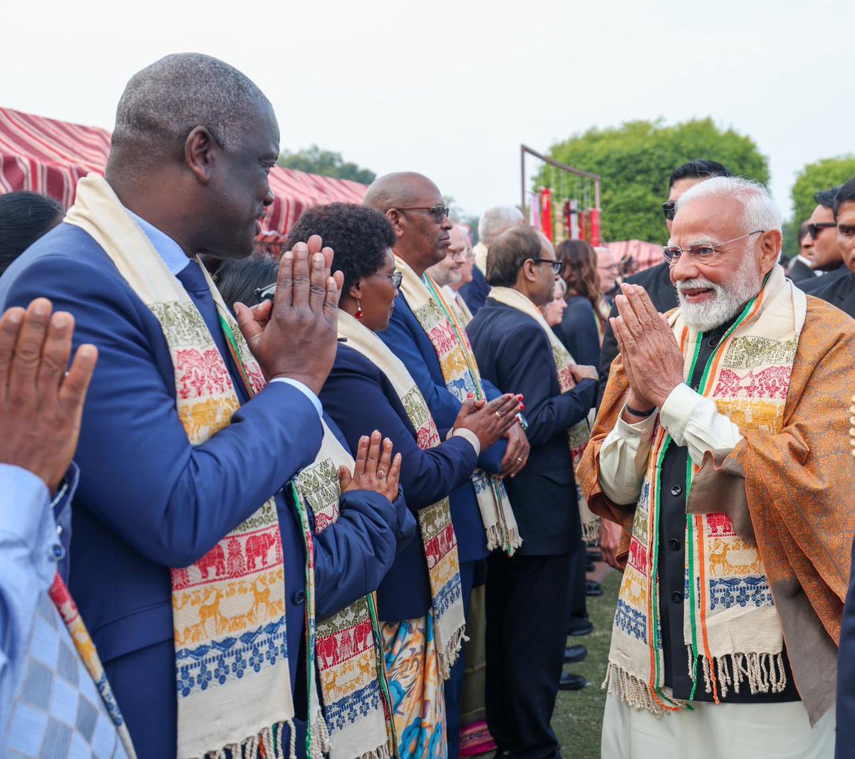 amitmalviya's tweet photo. At today’s At-Home Reception at Rashtrapati Bhawan, the theme proudly celebrated the North-East.

From the Prime Minister to E.U. leaders and foreign envoys, all guests wore the traditional North-Eastern Patka as a mark of respect and inclusion.

Only Rahul Gandhi chose not to wear it, despite being reminded twice by President Droupadi Murmu herself.

Respect for India’s diversity isn’t selective. It’s a choice.