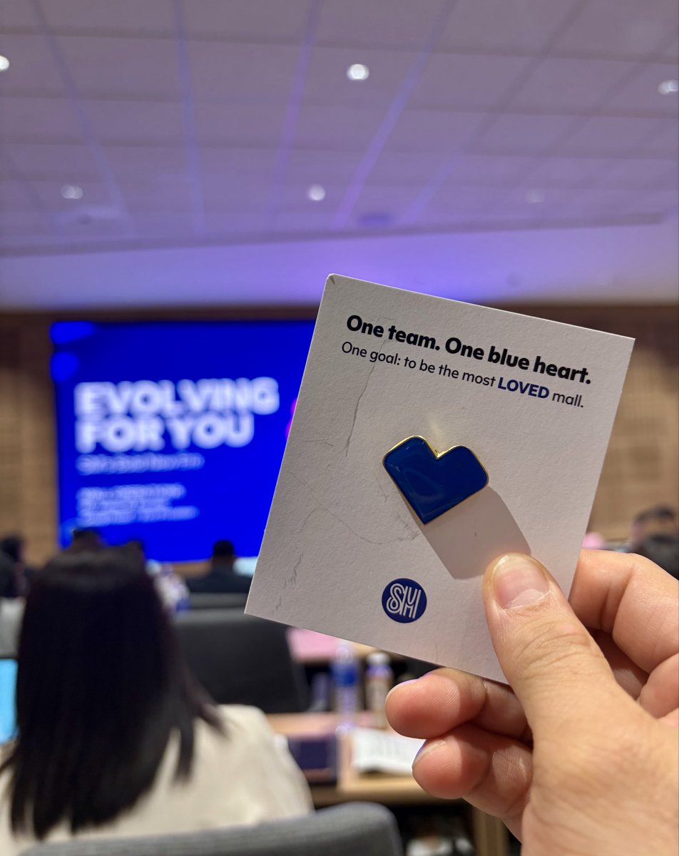 Chad_Caluyo's tweet photo. Today’s surprise is a BLUE HEART PIN presented by our SM Supermalls President as he closes his speech, marking the beginning of a new era of evolving with our customers.

One team. One blue heart. 
One goal: to be the most loved mall.

ALL FOR YOU 💙

#SMisAllForYou #SMSupermalls https://t.co/JCr2GOmoJP