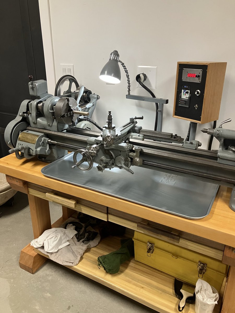 ButlerWatchCo's tweet photo. 1951 South Bend 9” lathe in our shop. We use it for some case back mods, but mainly to help build jigs, fixtures, and parts for our company truck 1967 Ford F250. The bench top was milled from 800 year old Doug fir. Mortise and tenon joinery build the legs. https://t.co/AIIyw4S0cL