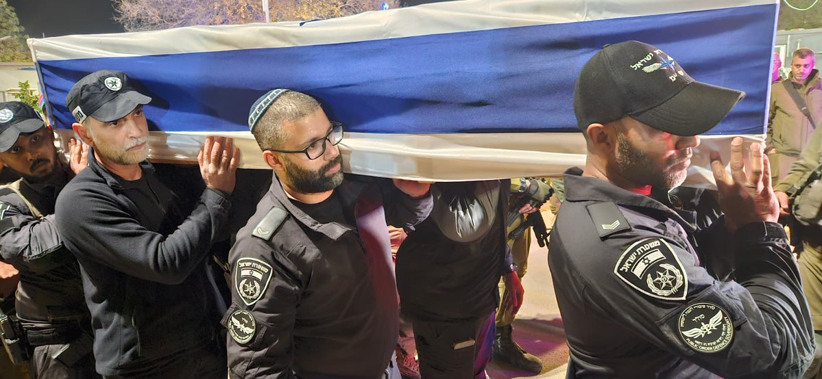 manniefabian's tweet image. A brief ceremony is being held by the police at the IDF's Nahal Oz base near the border with Gaza, in memory of slain policeman Master Sgt. Ran Gvili, whose body was recovered from the Strip today.

Gvili's father, Itzik, and Police Commissioner Daniel Levy are attending the…