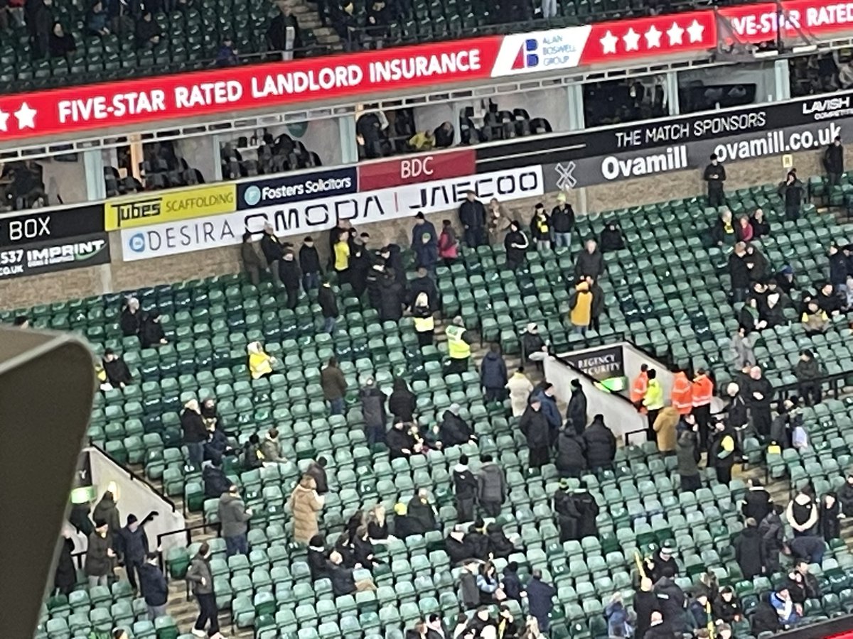 CGoreham's tweet image. A lovely touch. Philippe Clement in the bottom tier of the River End stand to lay a yellow and green scarf on the seat where Jim Davies, who died at the end of the last home game, used to sit. Warm embraces for family and friends too.