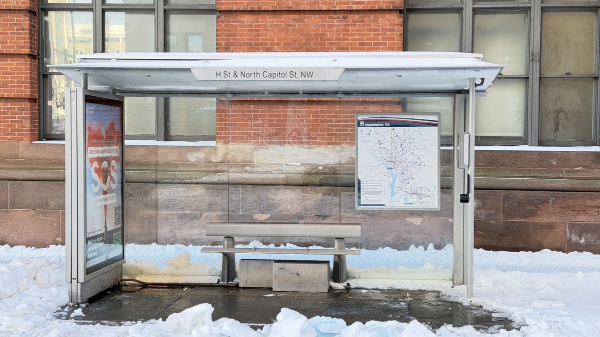 DDOTDC's tweet photo. #DDOTDC crews are working to clear snow and ice from bus stop shelters across DC as cleanup continues.

If you must travel, plan ahead, allow extra time, and use caution when entering and exiting stops. Stay informed with the latest service updates before heading out. https://t.co/PXOiW93xJy
