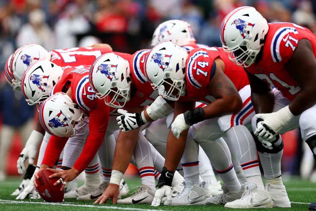 If I'm the Commish...this is an easy call.
"Recommend" this move to both teams.

Sell a special edition of these with a Super Bowl patch. 
Make eleventy-billion dollars.