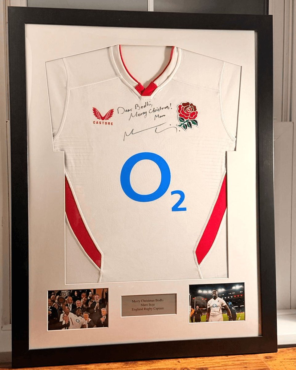 This item holds great importance. An England rugby shirt, paired with a personal holiday message, is preserved to safeguard both the shirt and the precious memory it represents. These aren't just collectibles; they're treasured memories. 
Would you showcase it at home or work?