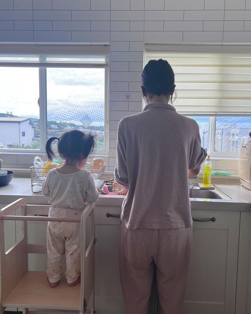 One thing about Elijah: a never never passes without him taking a picture if Klare and their daughter. 

He captures small and mundane moments– from them looking in the window, walking on the street, to flour-coveres giggles in Sunday morning. This is his way of stopping time.