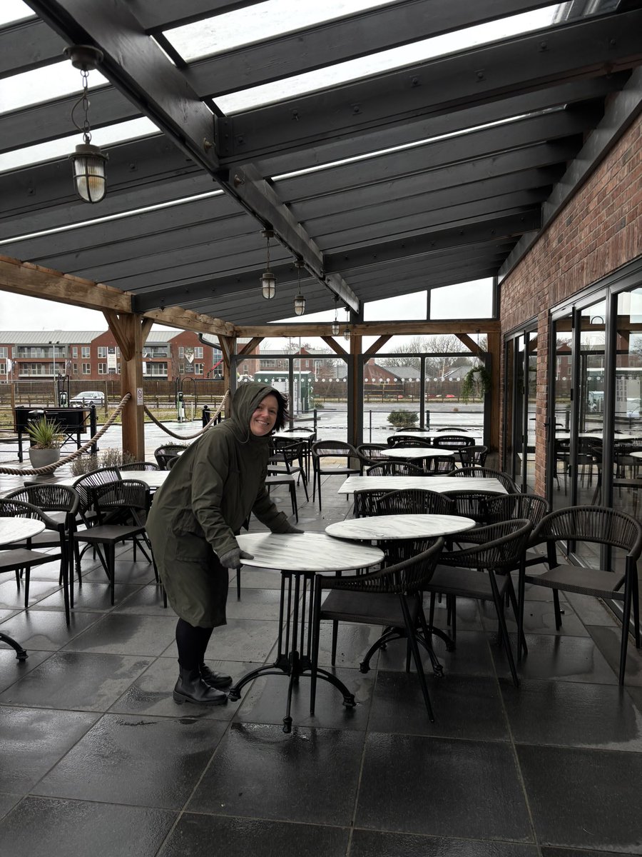It’s a windy one out there! Here’s Jo looking as glamorous as always making sure no more chairs end up in the car park 😆. theaviatorpub.co.uk