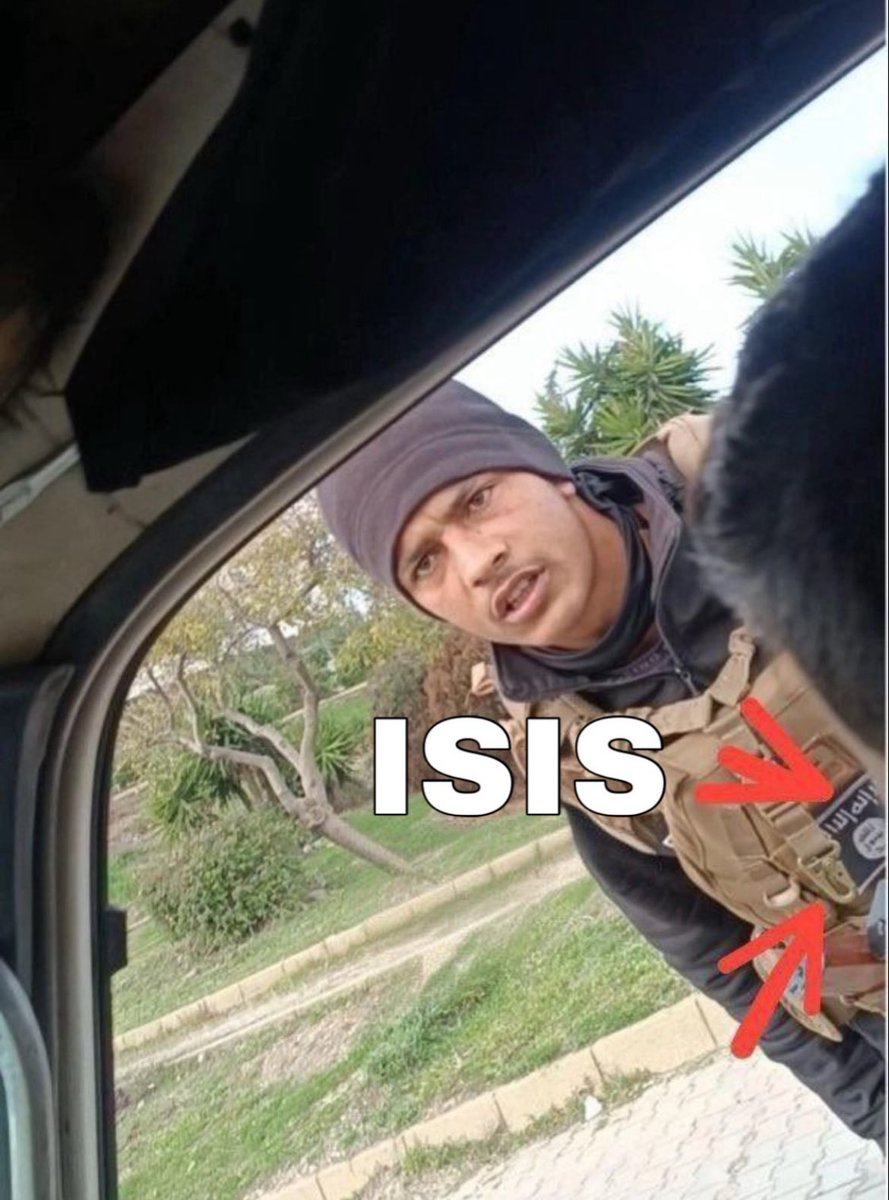 calebmclambsura's tweet photo. Images of a Syrian Soldier at a Checkpoint wearing the ISIS flag on his uniform. This is not a Government, nor is it a Military. THIS IS ISIS! https://t.co/KPAN26qc6G