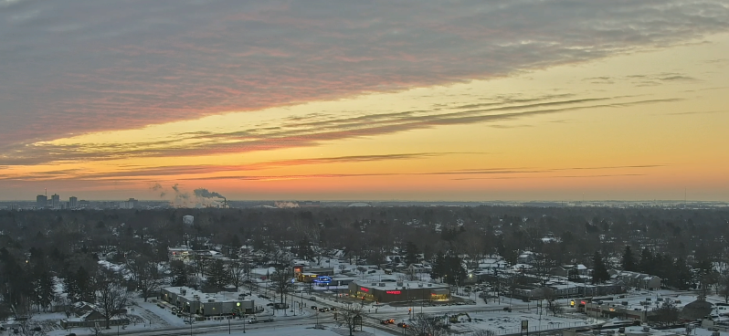 A beautiful sunrise across cold and snowy Champaign.