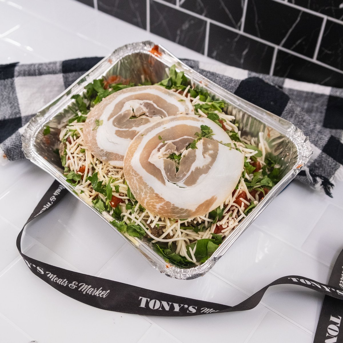 Warm up with Tony's classic Italian Smothered Meatloaf. This easy weeknight meal features our traditional meatloaf, covered in Tony's Marinara sauce and topped with mozzarella and thinly sliced pancetta.

On sale January 27–28 only for $5.98/LB (reg. $9.98).