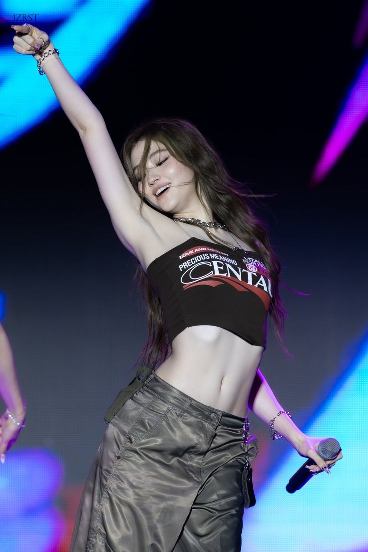 When Ella steps onto the stage, it catches fire, because her stage