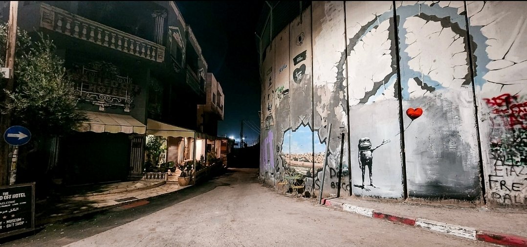 Purpe has emerged at Banksy's Walled Off Hotel in Bethlehem 🐸🕊️🎈