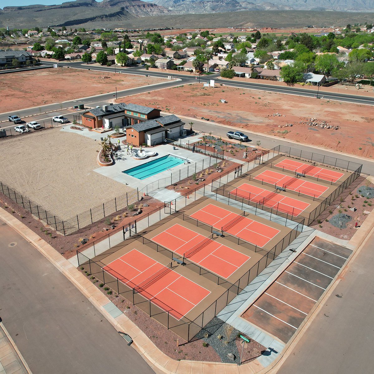 ZwickBuilds's tweet image. Looking back on sunnier and warmer months, Coyote Landing Clubhouse and pools was completed in the spring of last year. Located in Santa Clara, UT, this resort includes a clubhouse, lap pool, hot tub, and several pickleball courts.