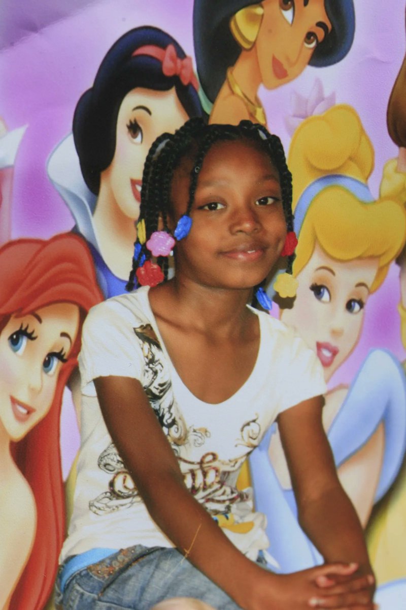 seven years old, hit with a grenade that set her on fire then they shot her. when her grandmother reached for her, cops accused her of trying to grab the officers gun and arrested her. grandma's prints were not on the gun.