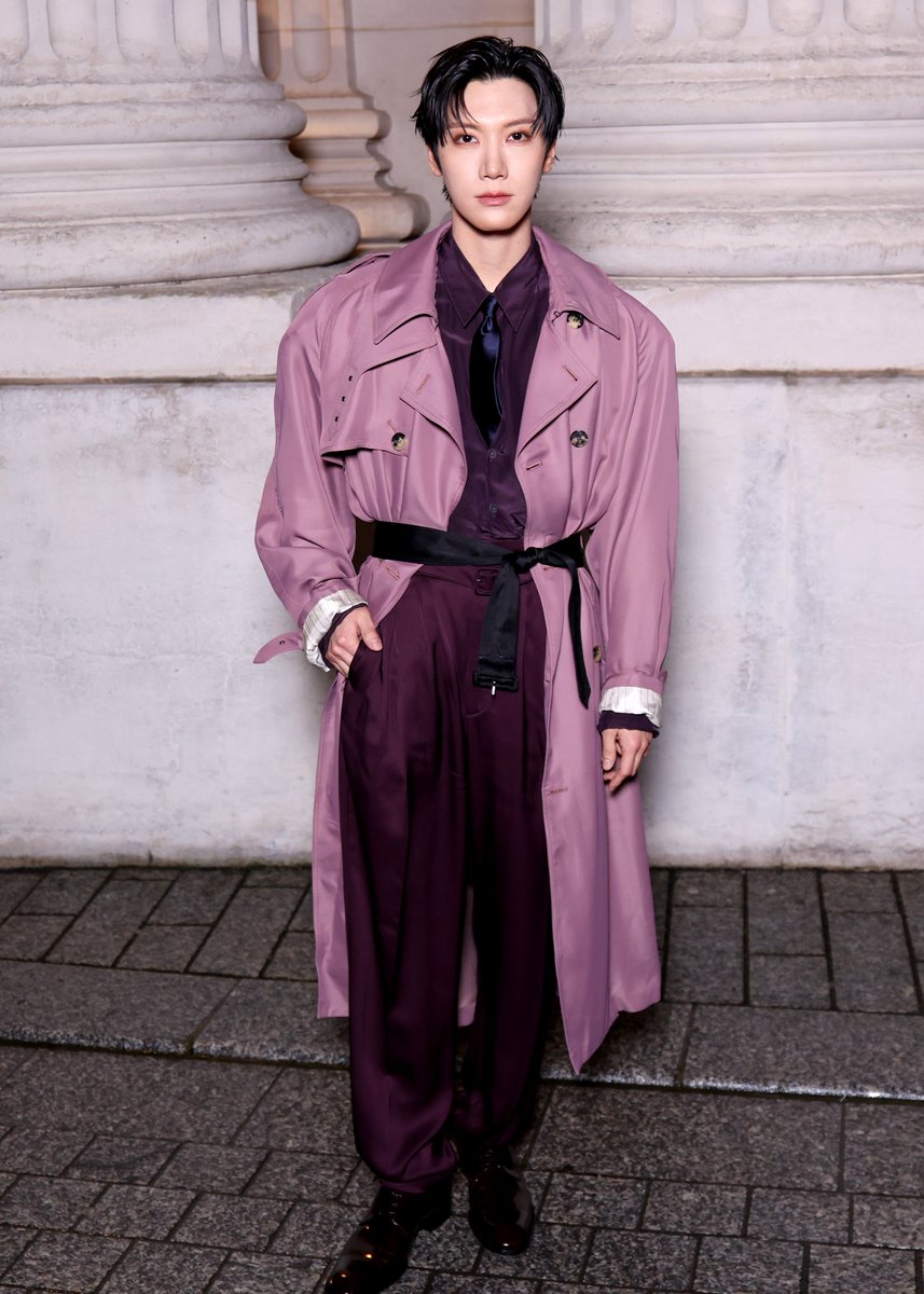 NCT's Ten attends the Saint Laurent Menswear Fall/Winter show during Paris Fashion Week.