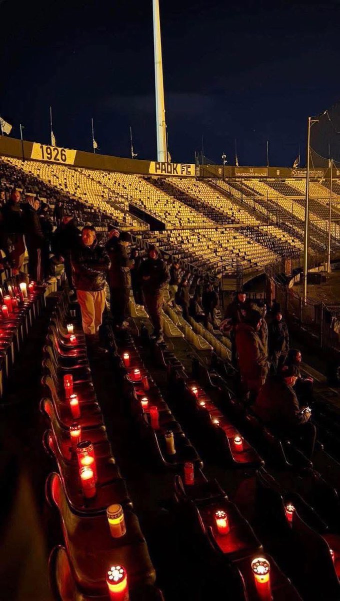 footyawayday's tweet photo. Fans of Greek side PAOK have lit candles inside the stadium tonight in memory of the supporters who were killed driving to France for their upcoming Europa League game against Lyon on Thursday 💔 https://t.co/XEGOuGX8U6
