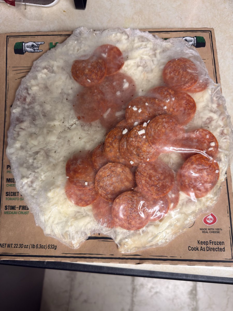 caseykoda's tweet photo. @screaminsicili1 please tell me why it looks like someone took a bite out of my unopened pizza. I immediately threw this away. https://t.co/Q7eeZkxy7K
