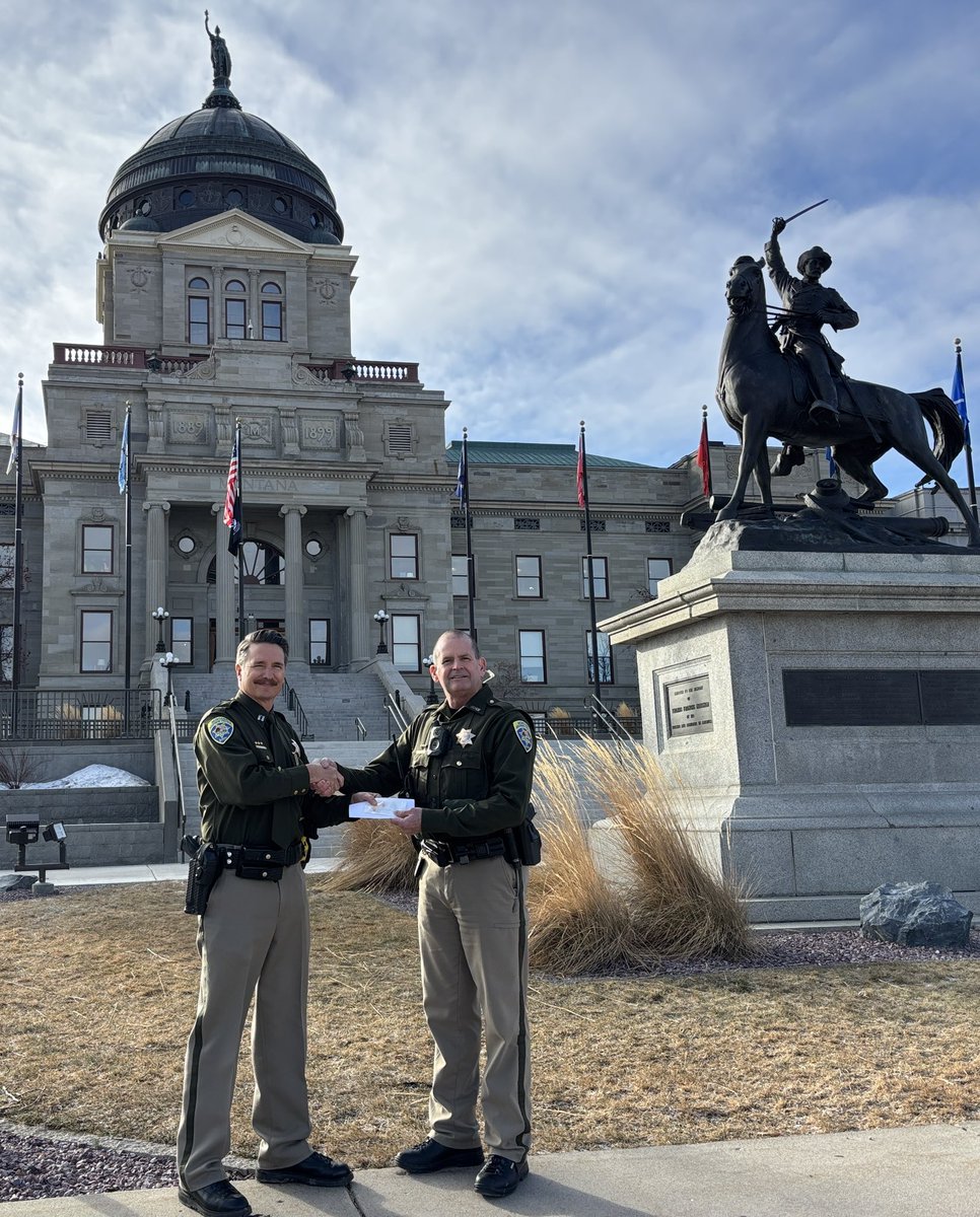 Trooper Inman (right) was awarded his 20-year service stars by Captain Cook! Thank you for your service and dedication to MHP.