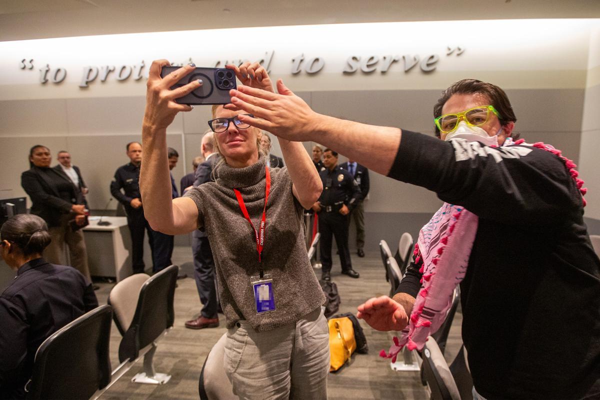 nypost's tweet photo. Radical lefties hijack LAPD meeting and attempt to silence California Post journalist in chaotic scene https://t.co/EPkPir1GWz https://t.co/0YDsBWn31N