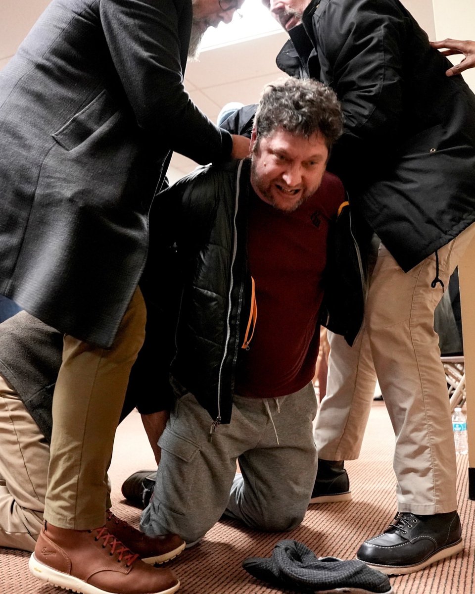 shomaristone's tweet image. TOWN HALL ATTACK: A man in the crowd charged at Rep. Ilhan Omar during a town hall in Minneapolis. You can hear the crowd saying the person also sprayed something at her: @fox5dc