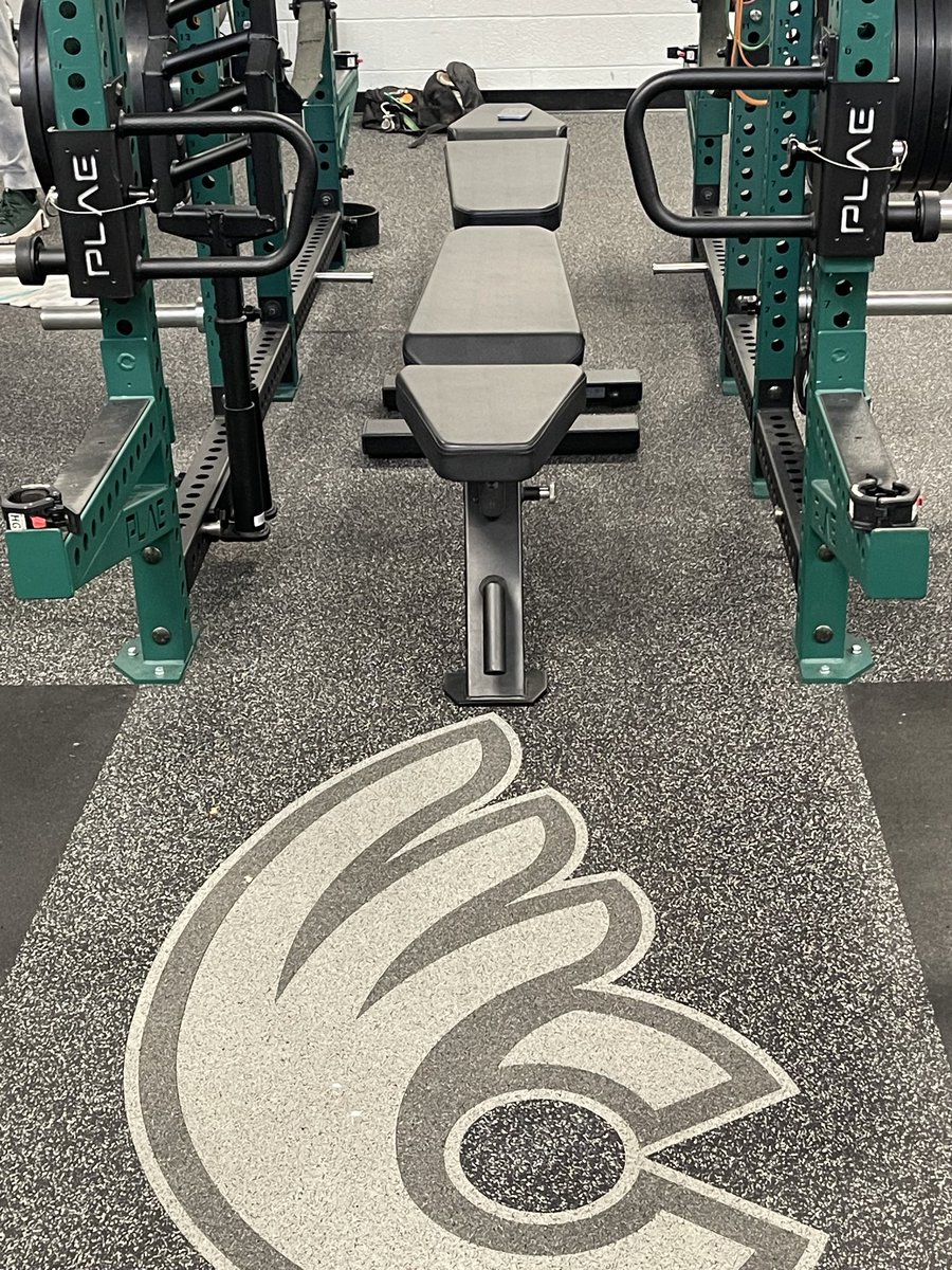 CoachKBurke3's tweet photo. The weight room builds strength, power, explosiveness, and confidence.  It helps close the gap between our present reality and our potential.  When players show discipline and consistency in this room, the growth potential for the entire team rises exponentially. 

@DubC_Football https://t.co/M3UZQmPuFx