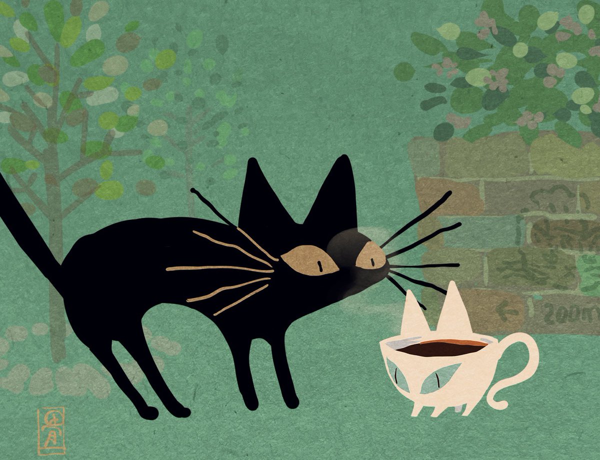 コーヒーカップの猫。