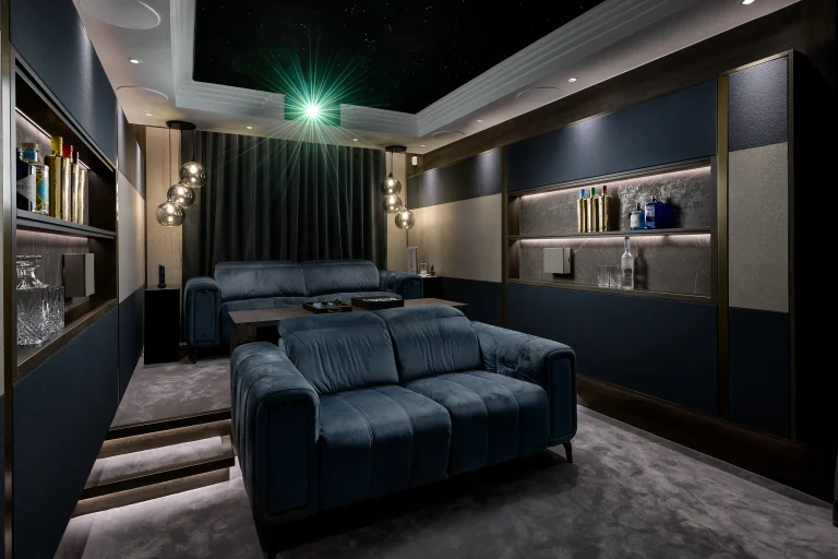 SHDesignCentre's tweet photo. A home cinema should feel like a proper room, not a screen bolted to a wall. Here, deep seating, layered lighting and a dark, quiet palette are all doing the same job: keeping the focus on the film.

Contact us now to book your visit to IndigoZest Sky House. https://t.co/1w3egog6pJ