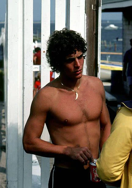 Paparazzi photos of John F. Kennedy Jr at Hyannis Port, Massachusetts in 1980.