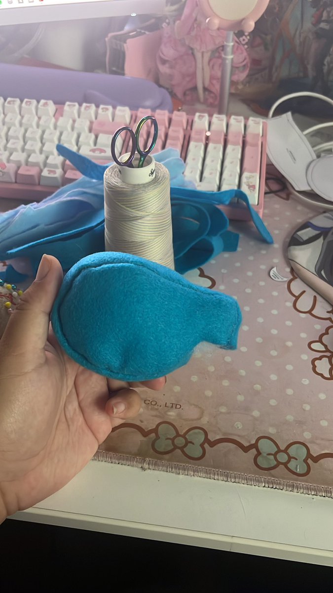 Ignore how messy my desk is, but making the baby a custom baby mobile; starting with the massive octopus centerpiece