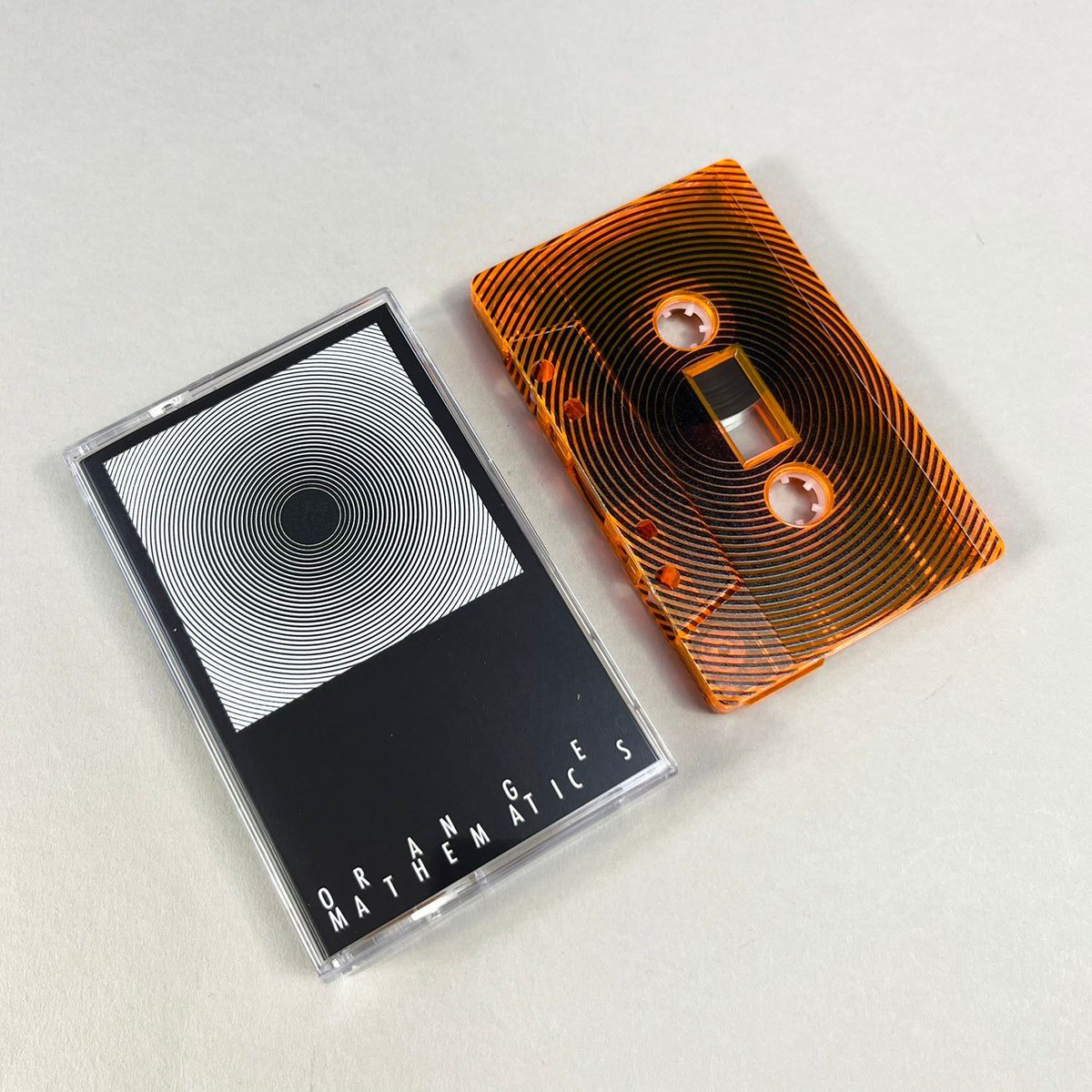 BandCDs's tweet photo. These cassettes made for 'Frontierer - Orange Mathematics' look incredible! 
2 versions; one transparent orange, and the other using our shiny mirror silver 🤩 https://t.co/qWN7QrajsS