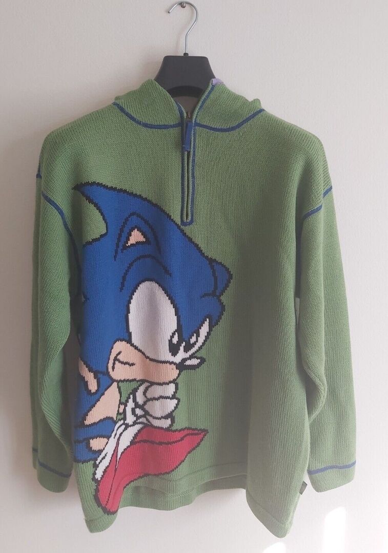 Photos of a Sonic knitted sweater, sold at SEGA World Sydney in 1997. 

Photos by jamjar6670.