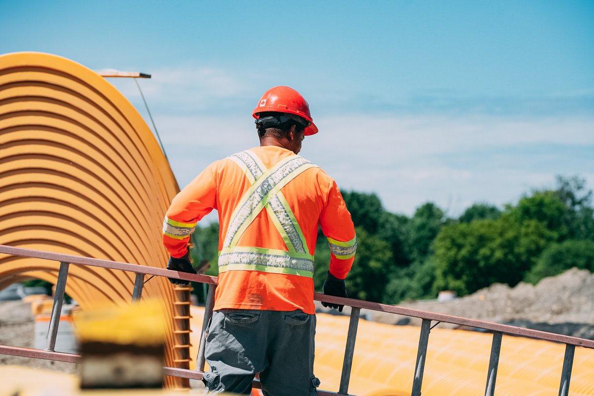 — On site, a crew member moves a ladder to support controlled trench entry during stormwater chamber work.

#heavycivil #civilconstruction #sanitary #watermain #pipelayers #heavyduty #construction #constructinghistory #mgicorp