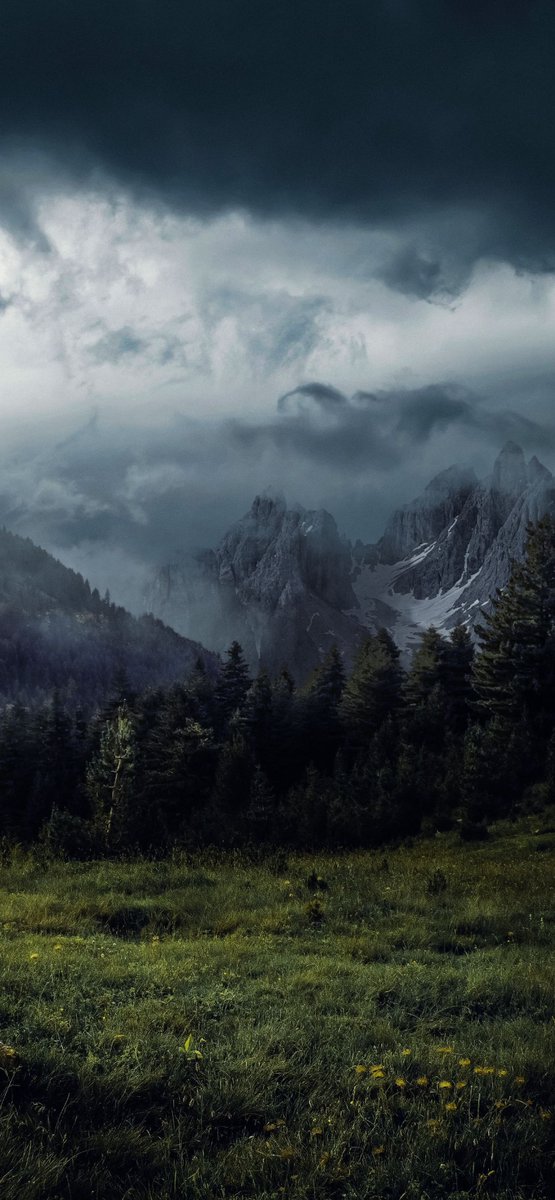 earthcurated's tweet image. "The mountains stay quiet while the clouds scream.