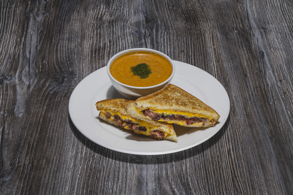 Warm up with our Smoked Brisket Grilled Cheese paired with Tomato Roasted Bacon Soup; the kind of comfort food that just hits right!

Dine in and stay cozy, or take the warmth to go.

#ComfortFood #TheKitchenTheWoodlands #DineTheKitchen #HoustonFoodie #VisitTheWoodlands