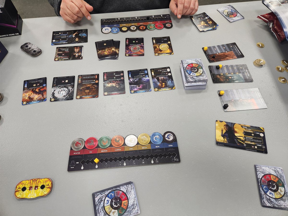 Asmoridin's tweet image. Clearing some more old pictures off my phone- game plays of the Mistborn Deckbuilding Game and Compile, against Rob back in December. Both very interesting, well-done designs. #boardgames